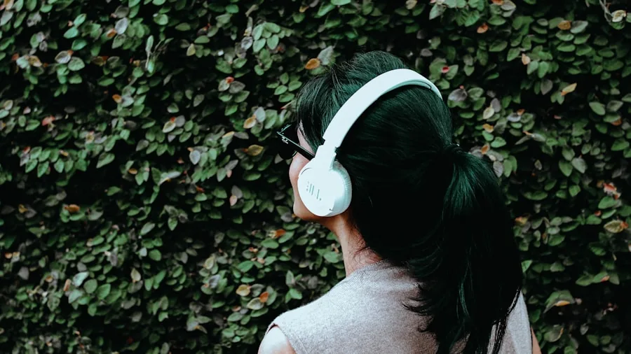 Person enjoying music with over-ear headphones during a comfortable, extended listening session