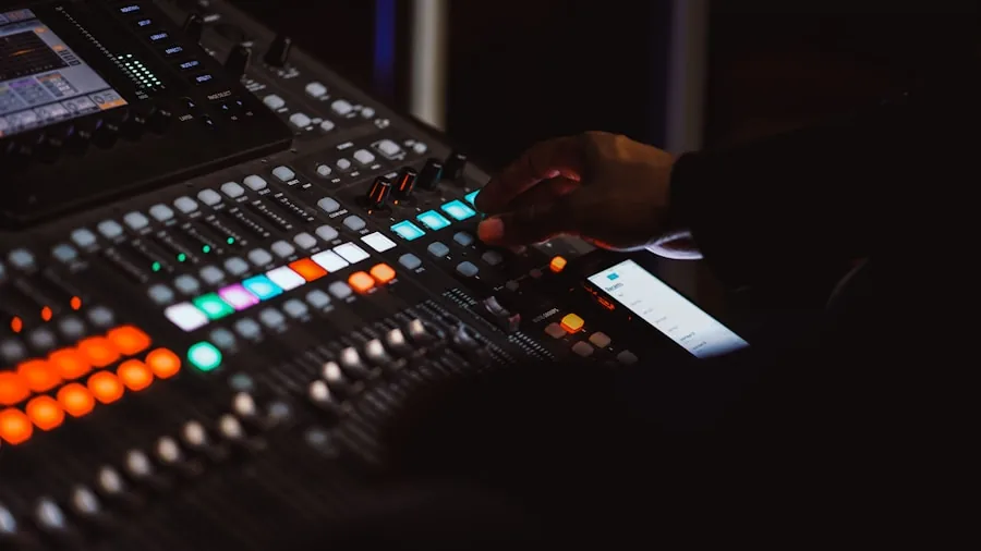 Person fine-tuning amplifier settings while listening to speakers in home music setup
