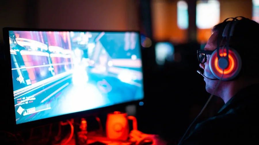 Person gaming across different devices and platforms in a casual setup
