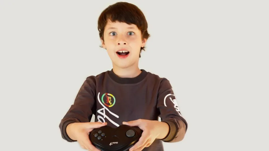 Person gaming with vibrant screen colors and dynamic lighting in a focused gaming setup environment