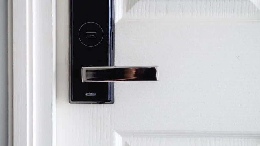 Person gesturing while speaking to smart home device in living room