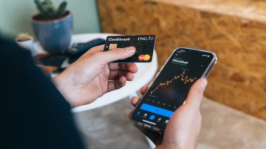 person holding gaming trade credit card