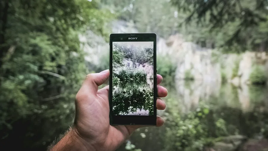 person holding premium smartphone outdoors