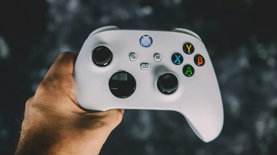 person holding video game controller