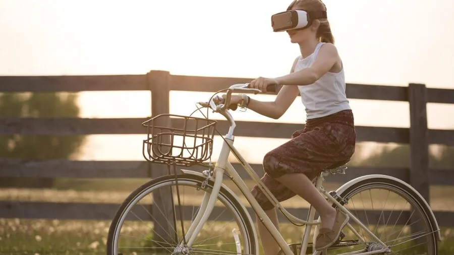 Person immersed in virtual reality experience, demonstrating VR ecosystem and software capabilities