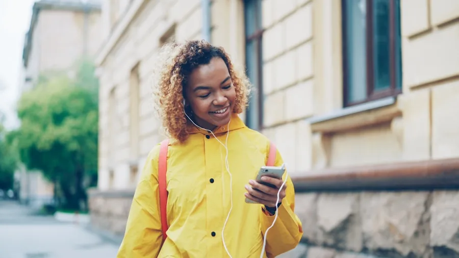 person listening earbuds outdoors
