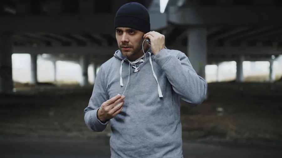 Person on phone call during outdoor workout in active lifestyle setting