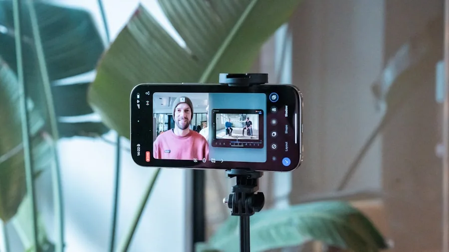 person recording video with mobile device