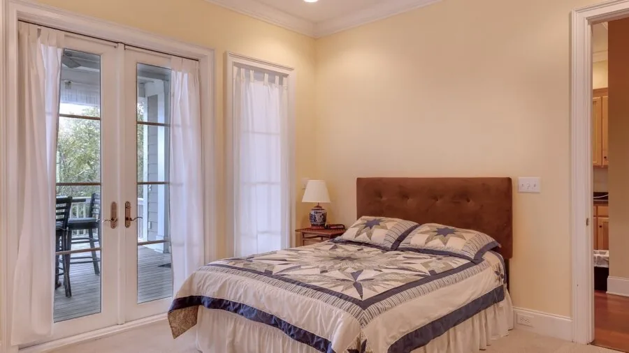 Person sleeping peacefully in a modern bedroom, representing privacy and rest with smart home technology