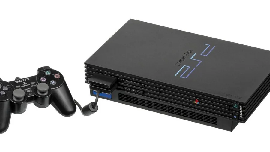 Person streaming at desk with multiple gaming devices and cables connected together