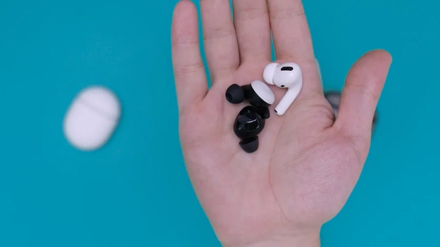 Person testing various wireless earbud designs and fits for comfort and audio quality