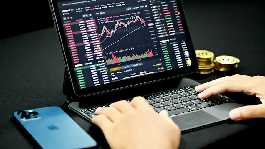 person trading in old tablet device