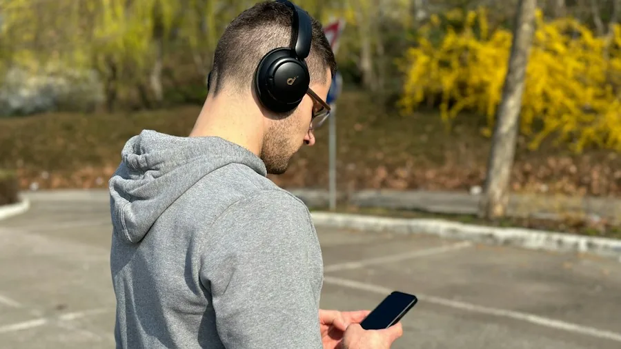 person wearing comfortable headphones commuting