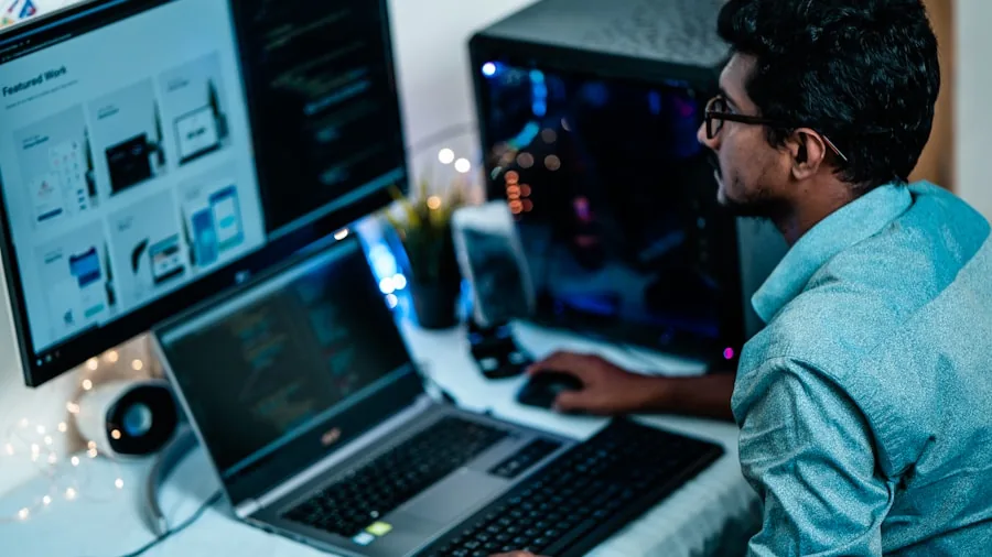 Person working at desk with computer setup, focused on productivity and efficient workspace organization