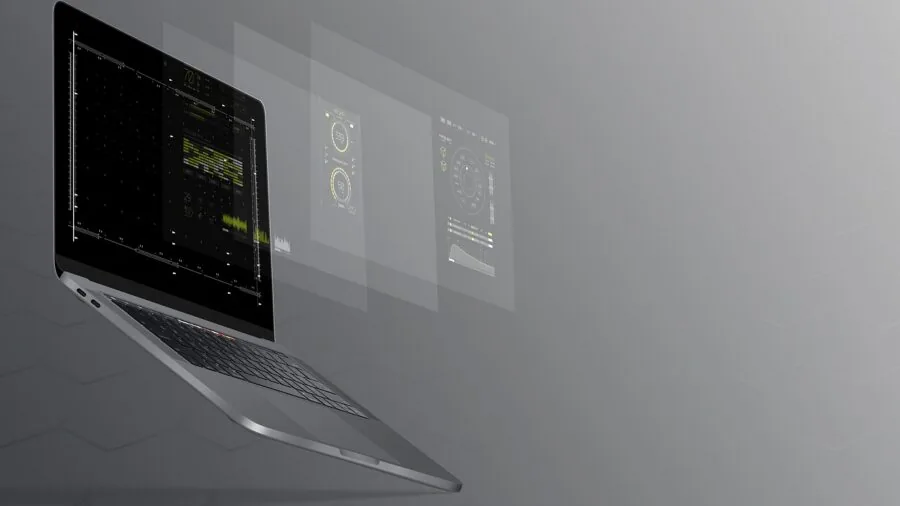 Person working at desktop computer with multiple applications and software interface visible on screen