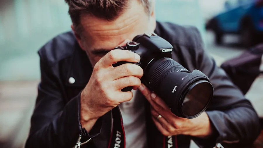 photographer reviewing camera specs