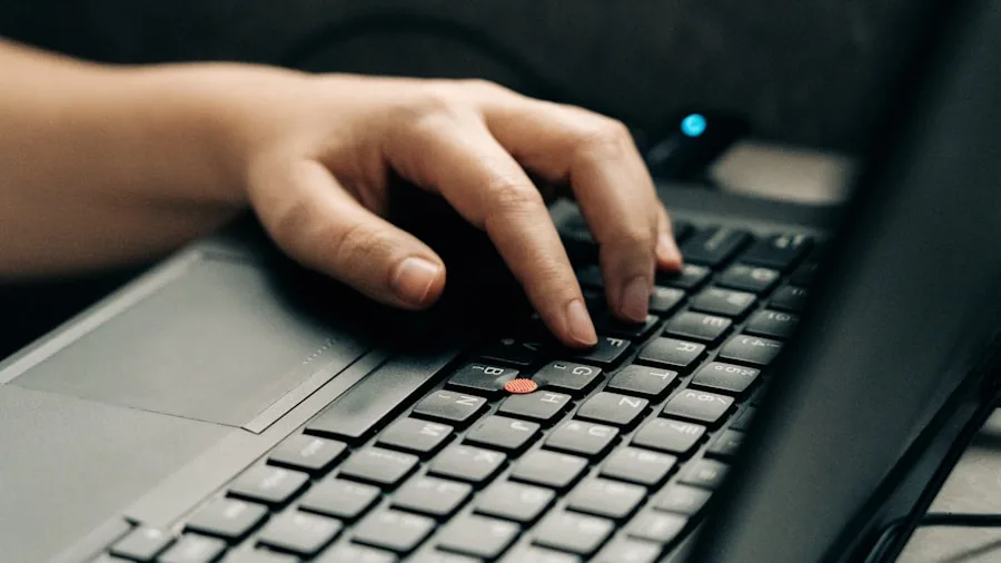 Professional at desk with computer equipment, emphasizing reliable technology and workspace protection