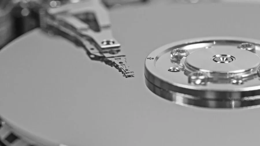 Professional setting up network storage infrastructure with computer equipment and cables