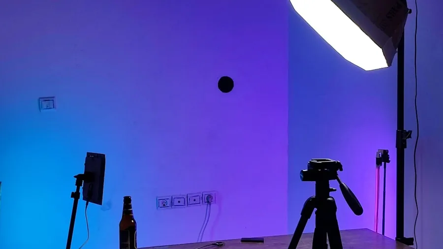 Professional streamer adjusting ring light and camera setup in home studio with natural window lighting