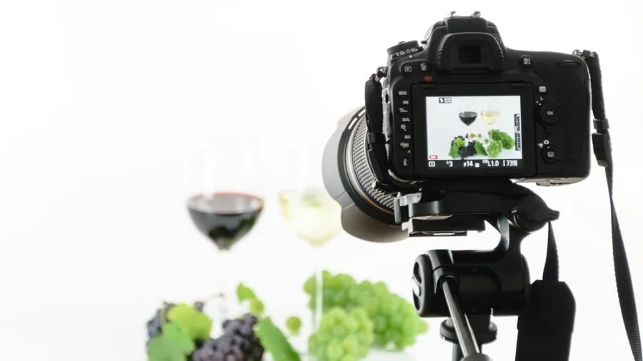 Professional tripod stand positioned in a creative workspace for video or photography setup
