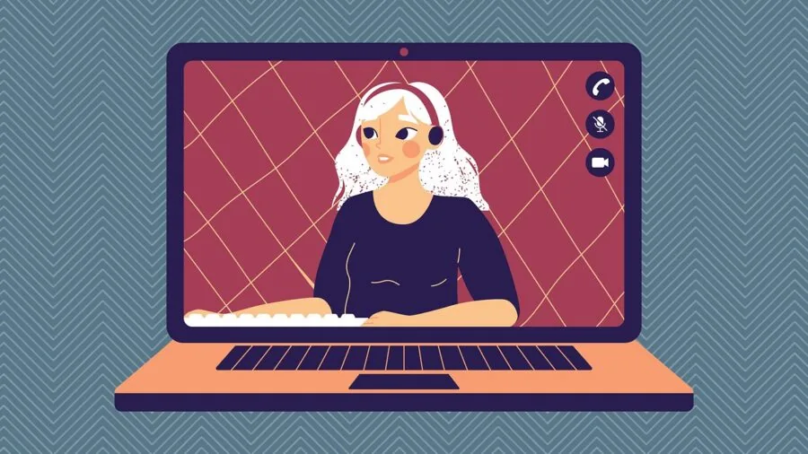 Professional using wireless earbuds during video conference on laptop at home workspace