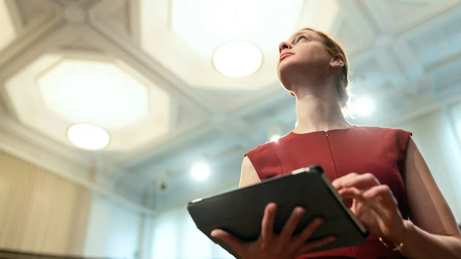 professional woman using tablet for work