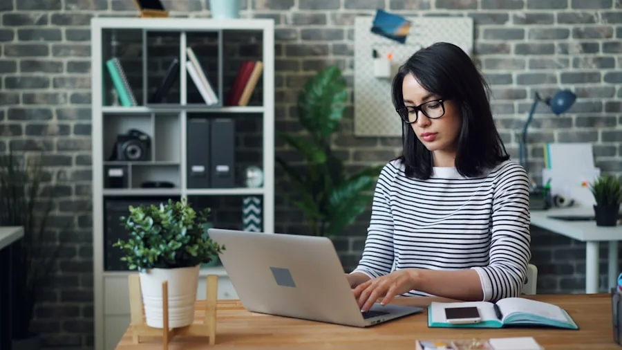 Professional working at desk with monitor displaying clear sharp content