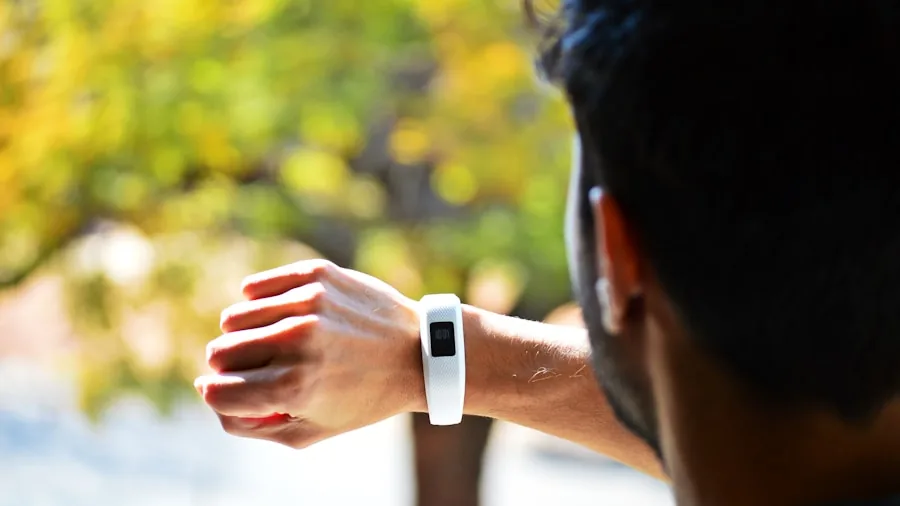 runner checking activity tracker