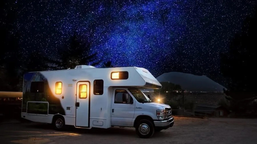 RV camper setup with portable power equipment during outdoor adventure trip