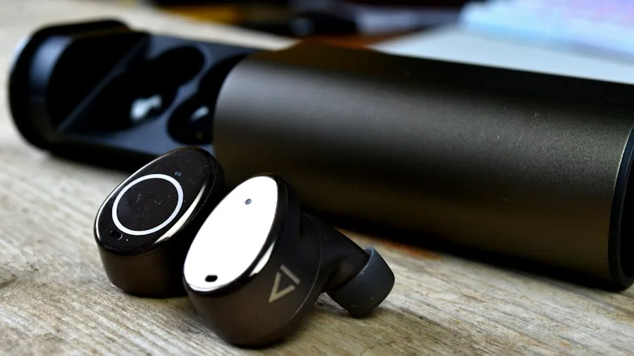smartwatch and earbuds display tech gadgets