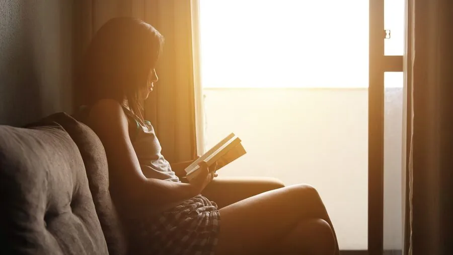 Student focused on laptop work, representing quick computing and efficient digital learning