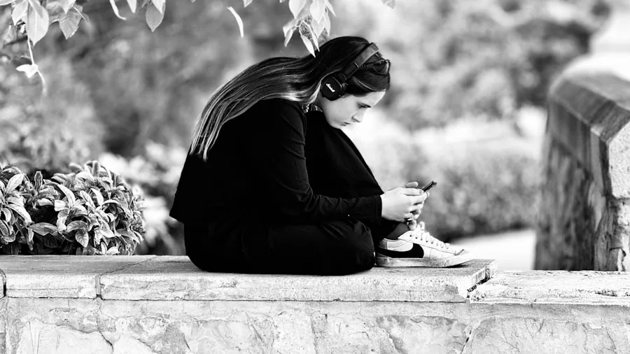 woman reading on tablet outdoors