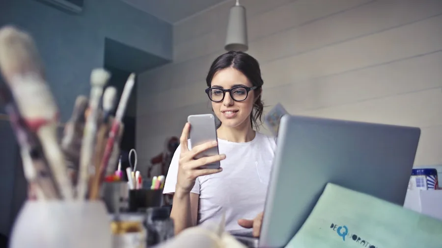 woman using business and personal phones