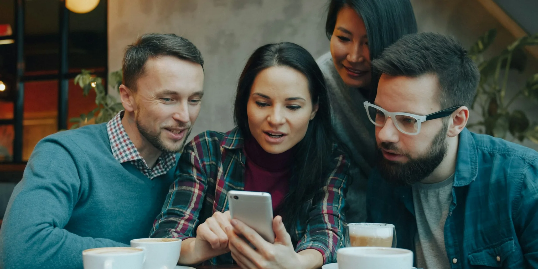 young people scrolling social media together